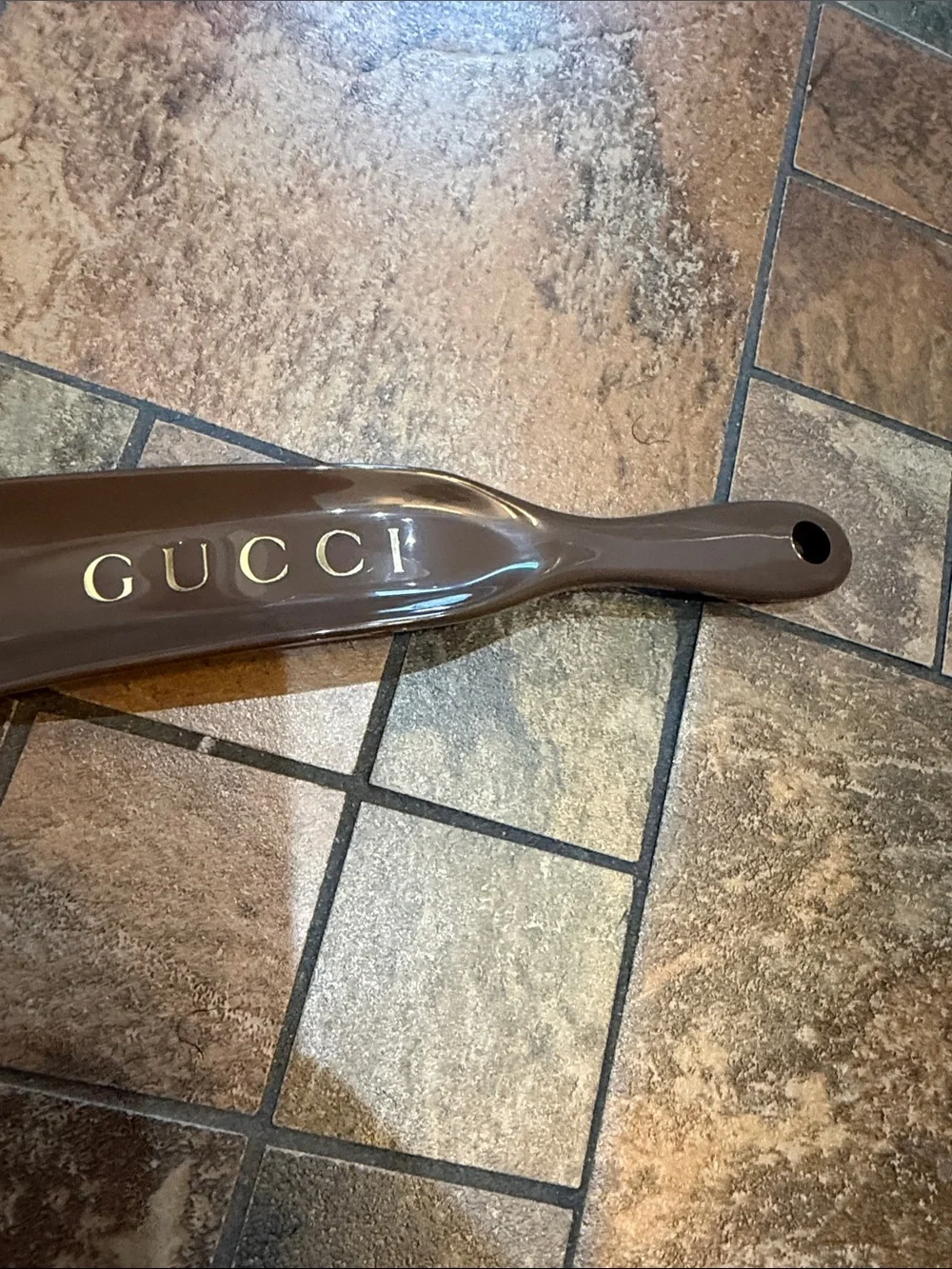 Gucci Brown Shoe Horn with Gold GUCCI Lettering